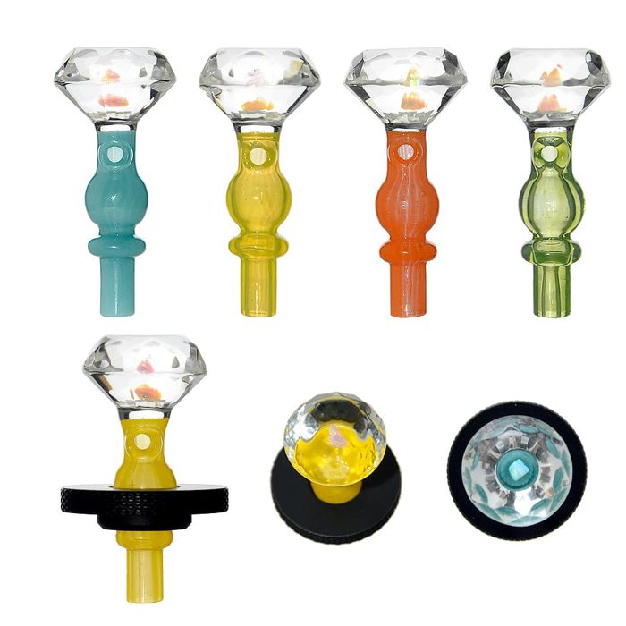 Calibear Diamond Facet caps: a faceted crystal ball with an opal core on colored glass stems