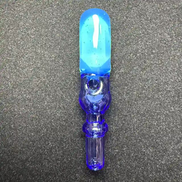 Dab Hut joystick cap in blue: a capsule-shaped blue glass top with a carb hole below it, a ring collar and a straight stem